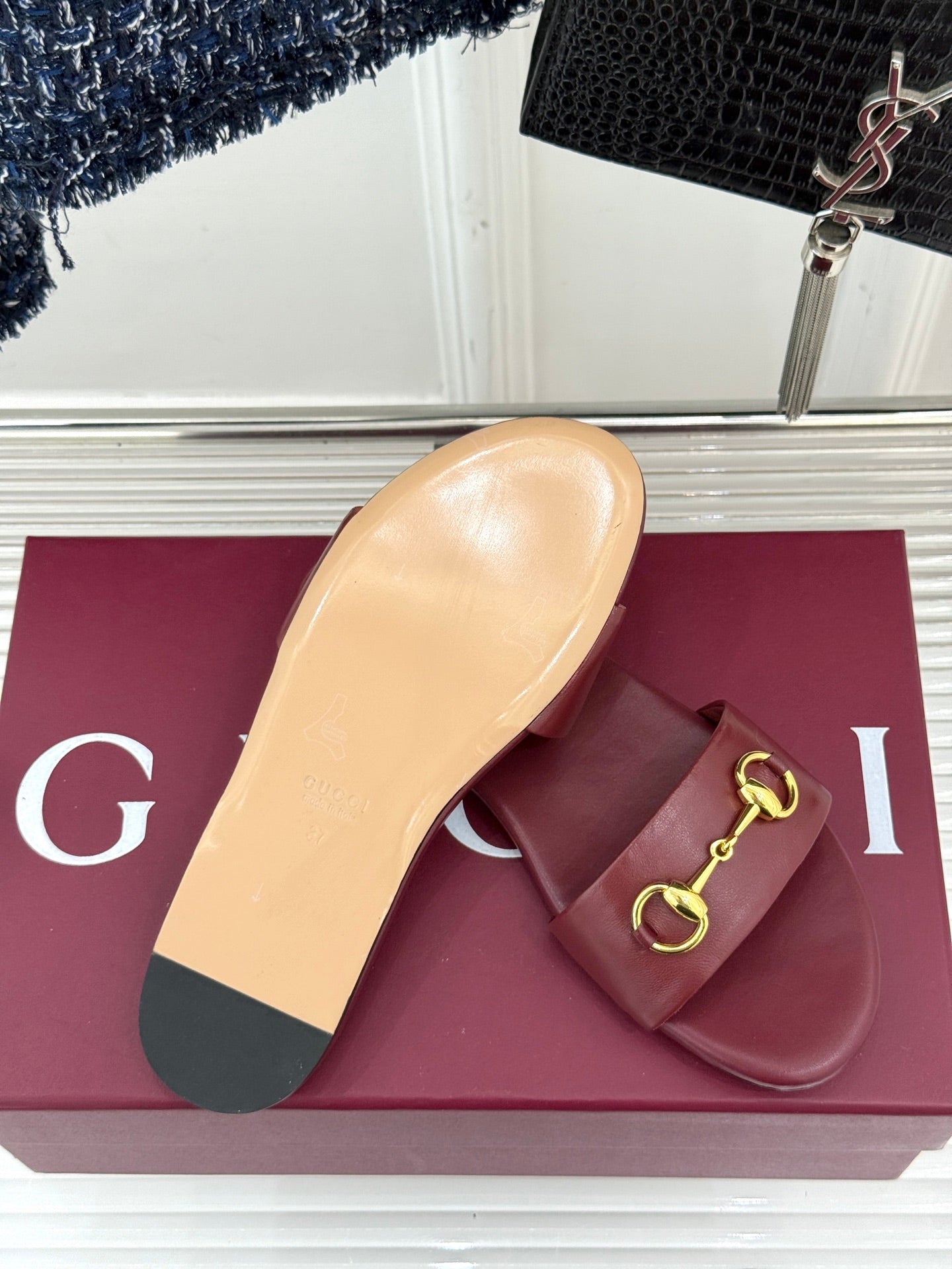 SLIDE SANDALS IN RED CALFSKIN WITH GOLD HARDWARE