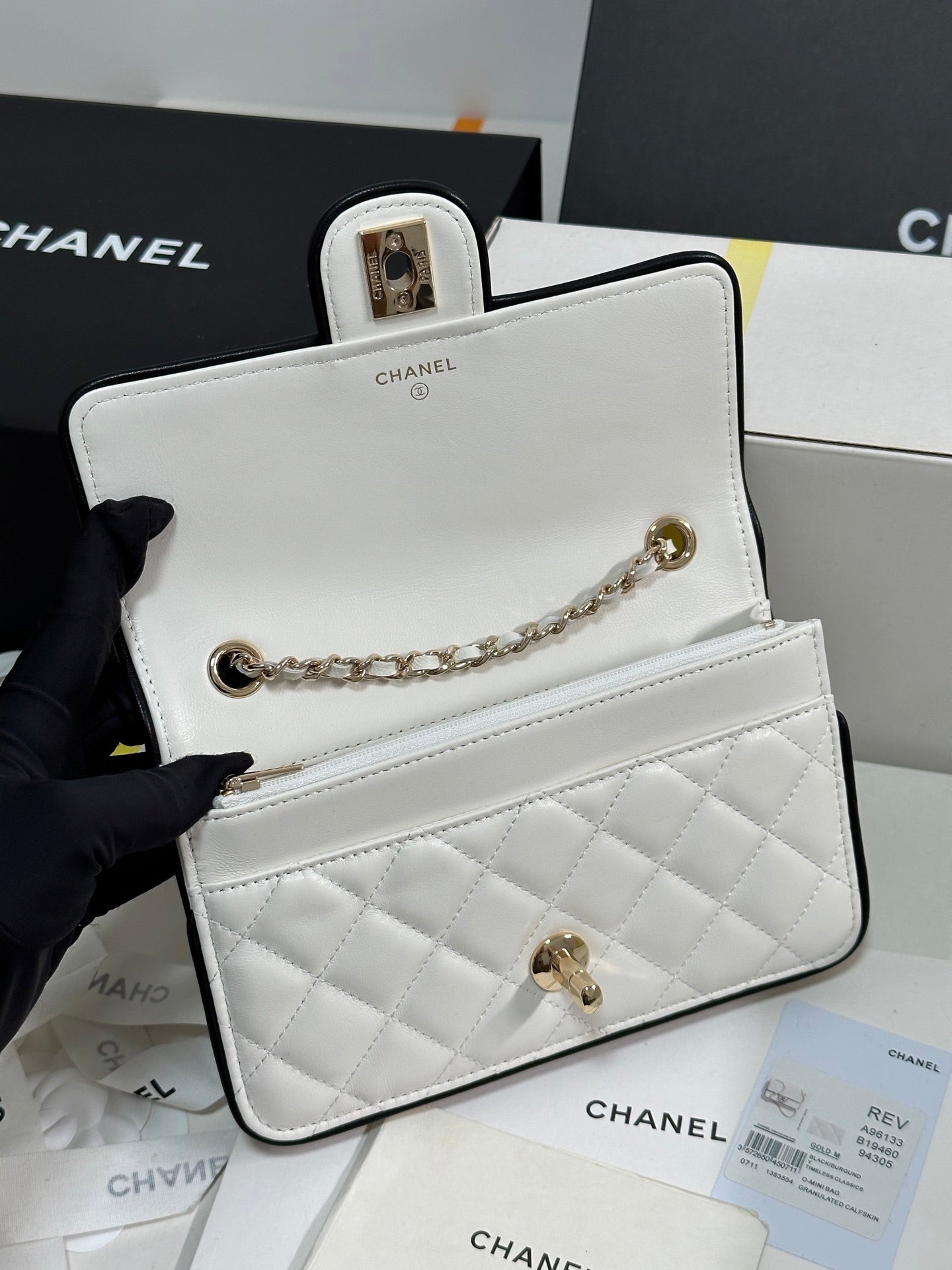 QUILTED FLAP BAG WITH BLACK TRIM 19 IN WHITE LAMBSKIN