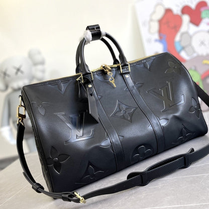 KEEPALL 45 BANDOULIERE MONOGRAM EMPREINTE GIANT