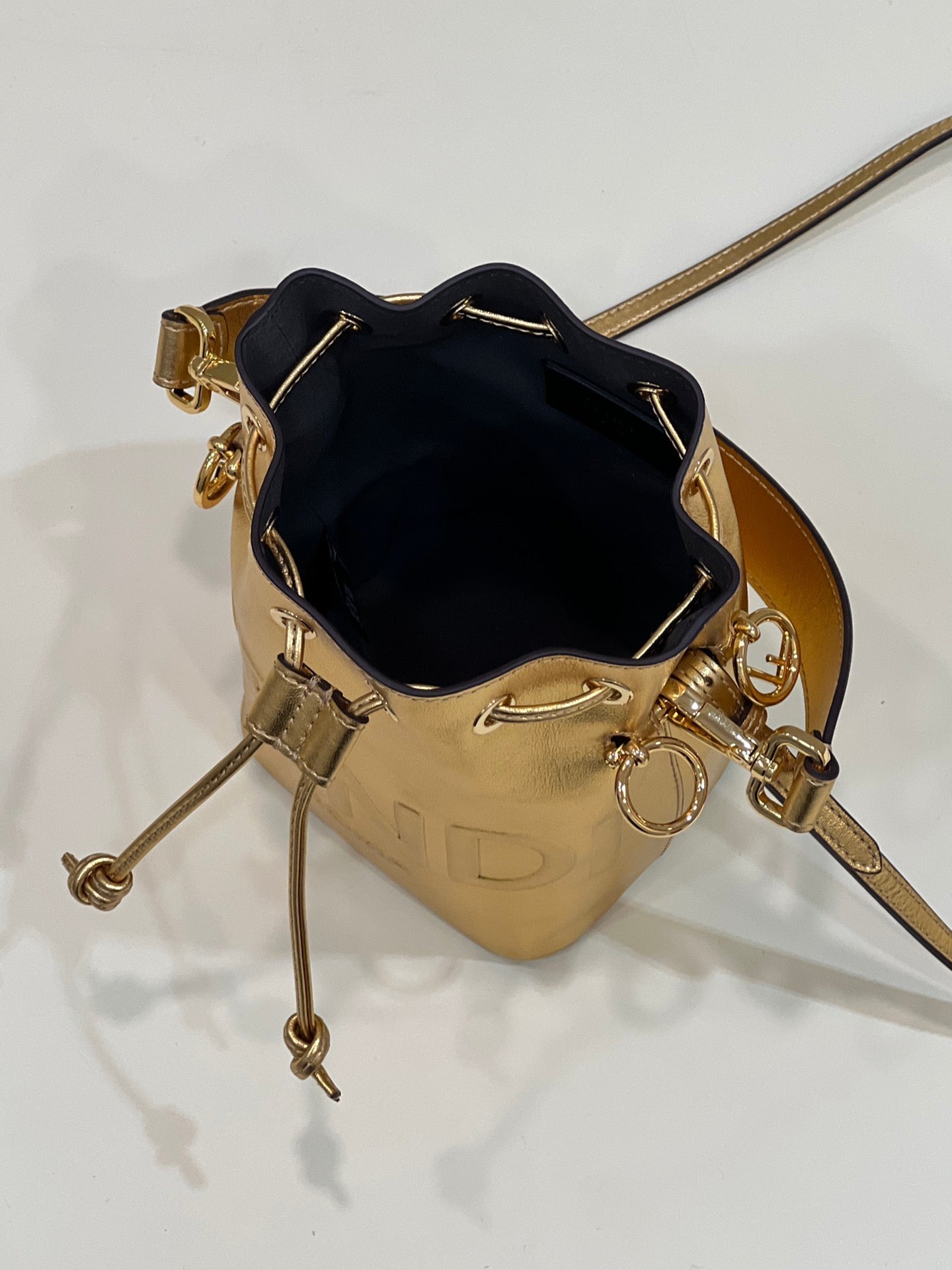 MON TRESOR 18 IN GOLD METALLIC CALFSKIN