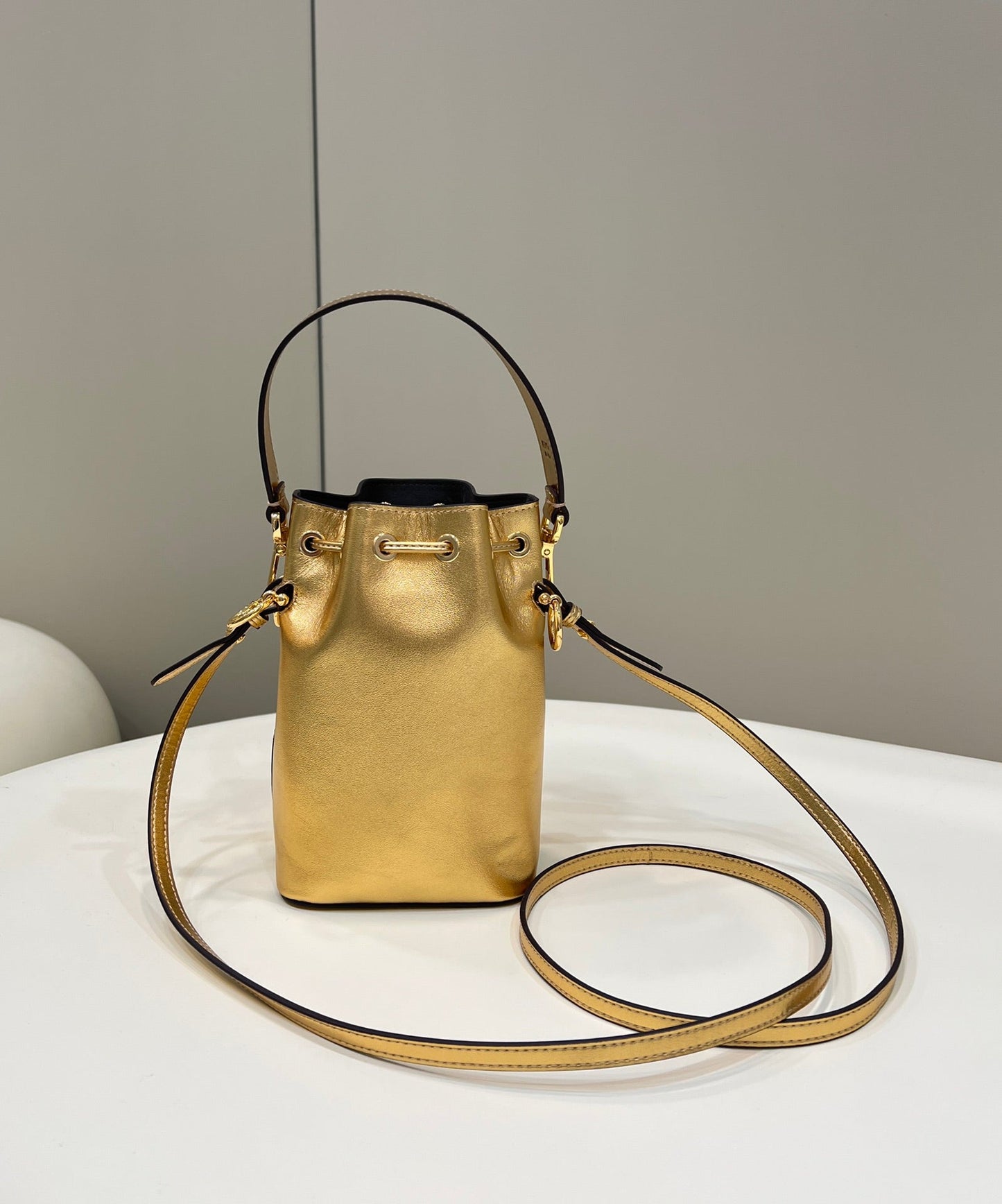 MON TRESOR 18 IN GOLD METALLIC CALFSKIN