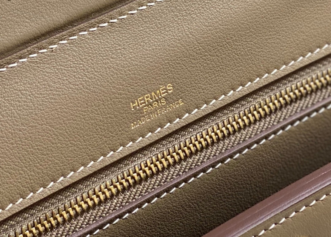 MINI 24/24 21CM IN TOGO ETOUPE EVERCOLOR CALFSKIN GOLD KELLY BUCKLE