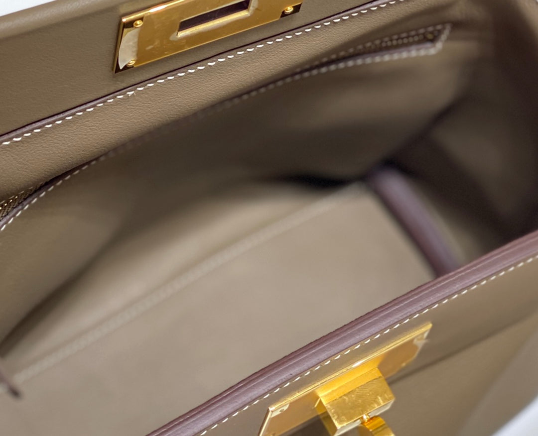 MINI 24/24 21CM IN TOGO ETOUPE EVERCOLOR CALFSKIN GOLD KELLY BUCKLE