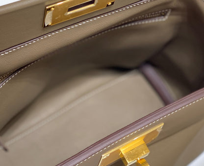 MINI 24/24 21CM IN TOGO ETOUPE EVERCOLOR CALFSKIN GOLD KELLY BUCKLE
