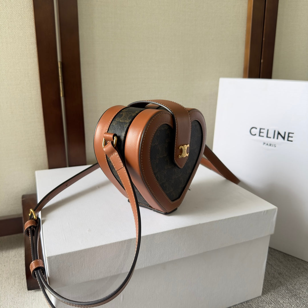 HEART TAMBOUR BAG 15 IN BLACK TRIOMPHE CANVAS AND BRONZE BROWN CALFSKIN