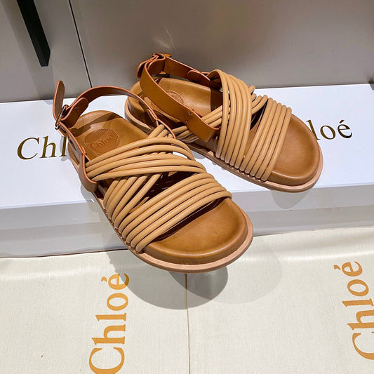 CROSS STRAP SANDAL IN BRONZE BROWN RUBBER WITH GOLD HARDWARE