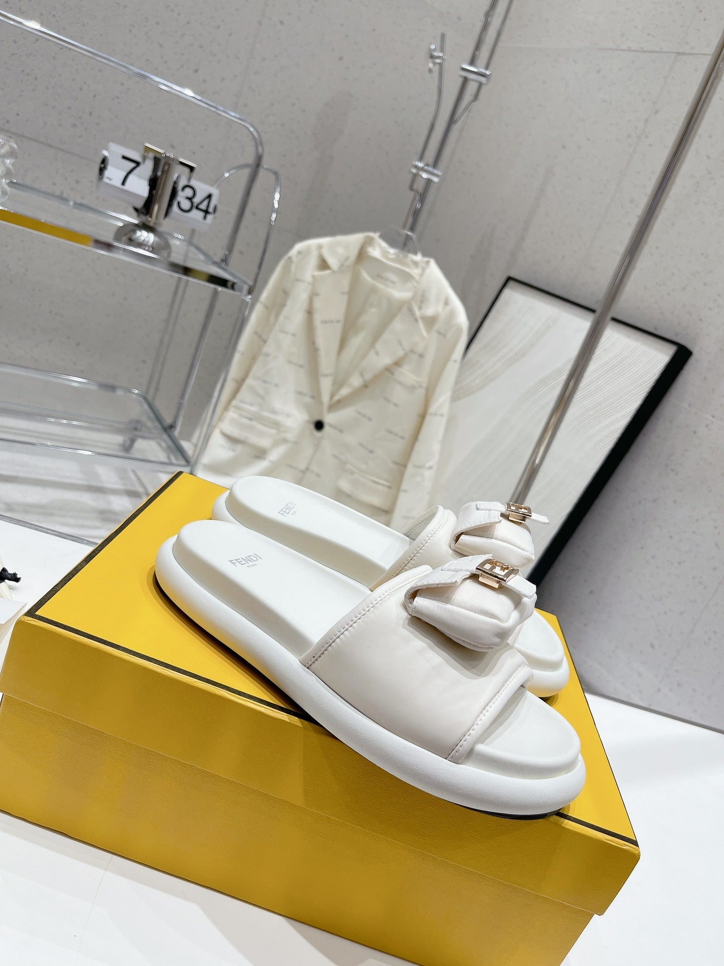 FENDI BAGUETTE SLIPPERS IN WHITE LAMBSKIN WITH GOLD HARDWARE