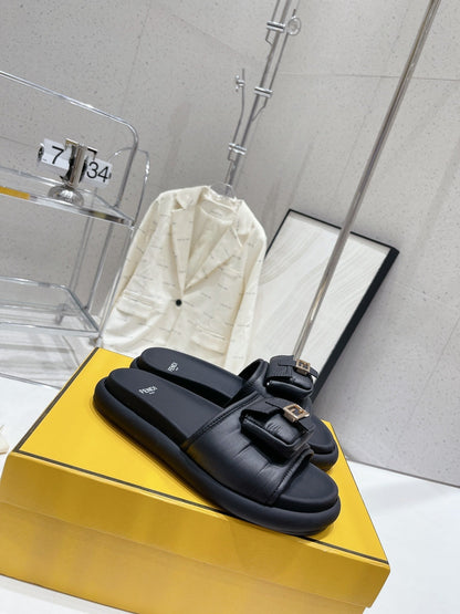 FENDI BAGUETTE SLIPPERS IN BLACK LAMBSKIN WITH GOLD HARDWARE