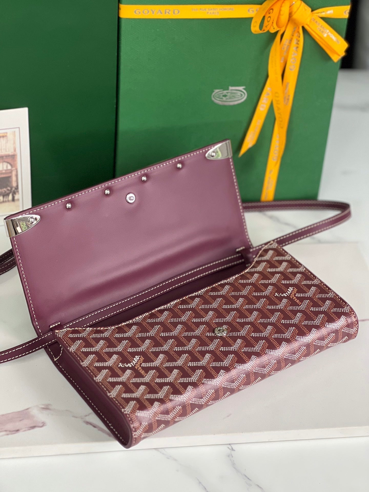 MONTE-CARLO PM CLUTCH 25 IN WINE RED GOYARDINE CANVAS