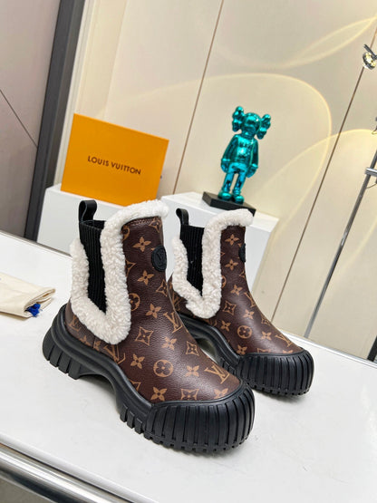 LV RUBY FLAT ANKLE BOOT IN CHOCOLATE BROWN MONOGRAM CALFSKIN AND WHITE SHEARLING