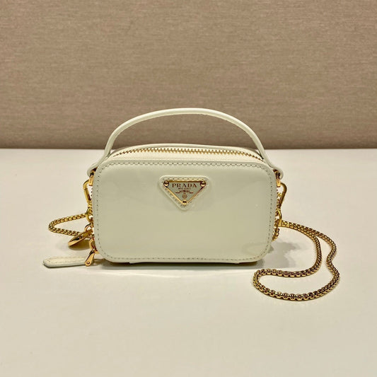 MINI HAND BAG 11 WITH GOLD STRAP IN WHITE PATENT CALFSKIN