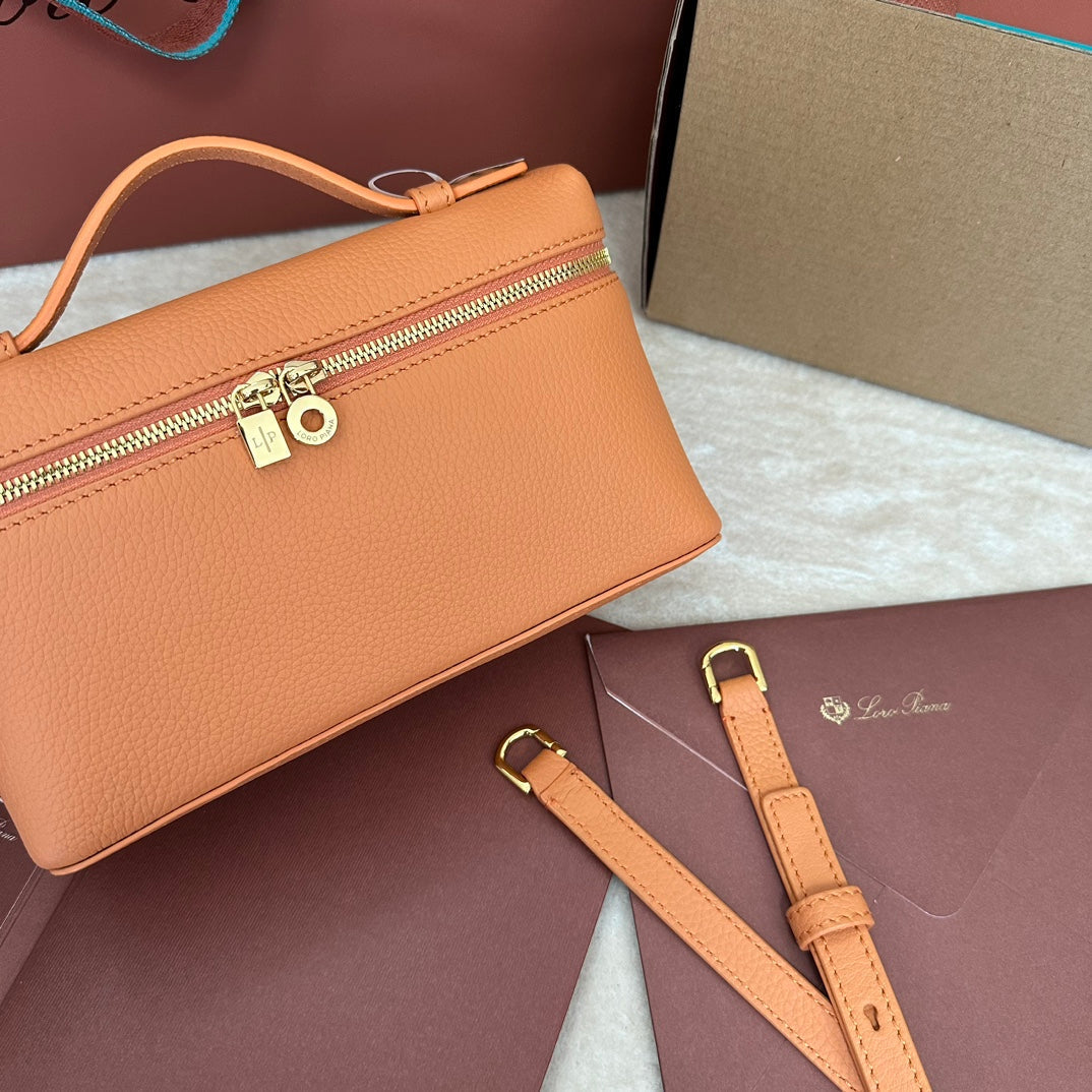EXTRA POCKET L19 IN MANGO ORANGE GRAINED CALFSKIN WITH GOLD HARDWARE