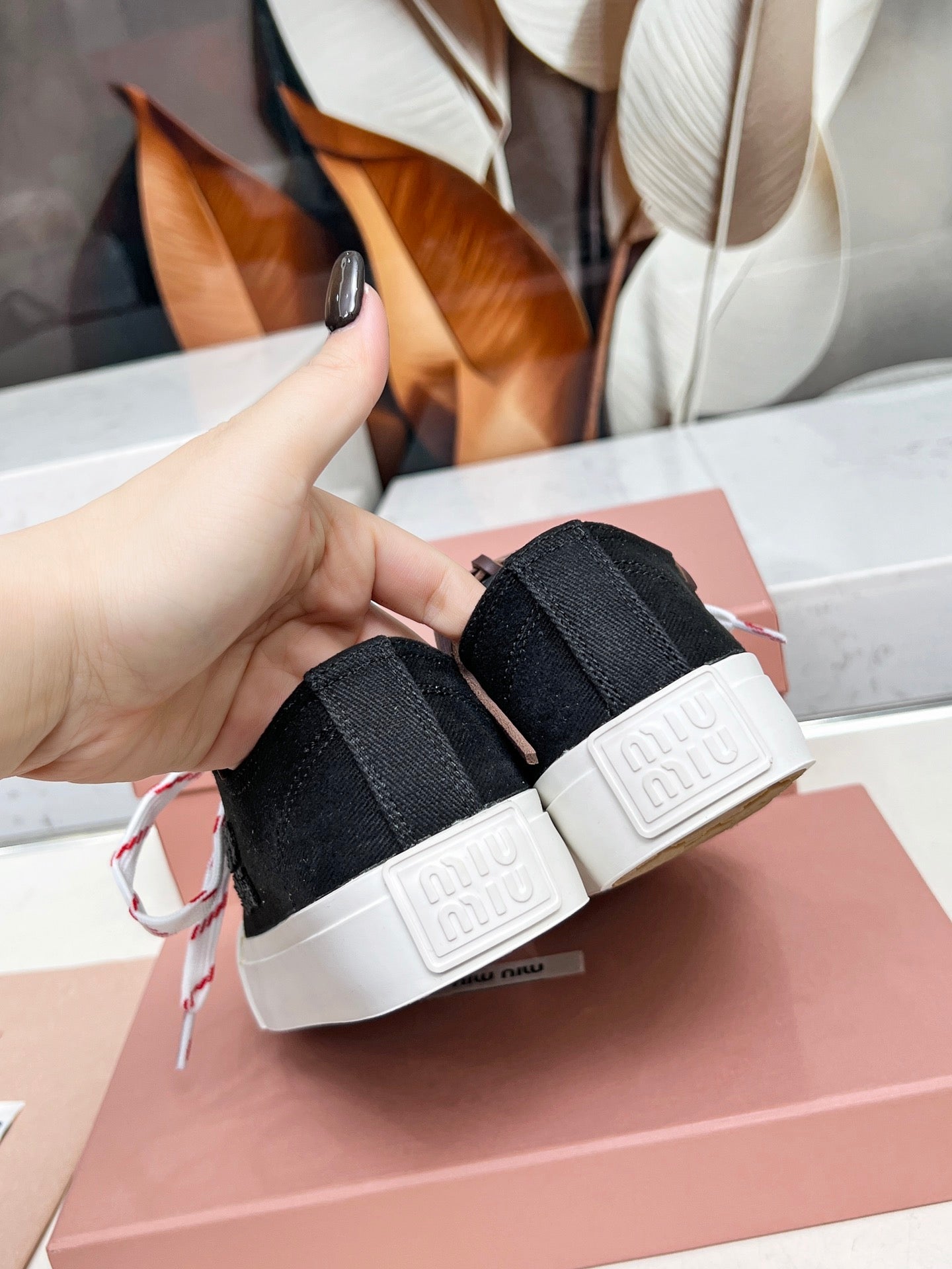 WASHED-DENIM SNEAKERS IN BLACK CANVAS WITH BROWN AND STRIPED LACES