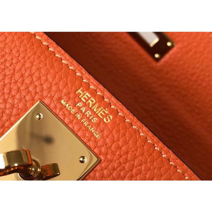 HERM Kelly 25cm Retourne Bag In Orange Clemence Leather