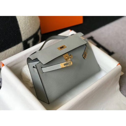 HERM Kelly Pochette Bag In God Epsom Leather