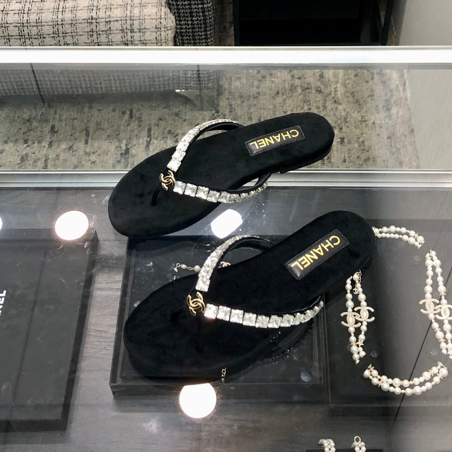 THONG SLIDE IN BLACK SUEDE WITH WHITE CRYSTALS