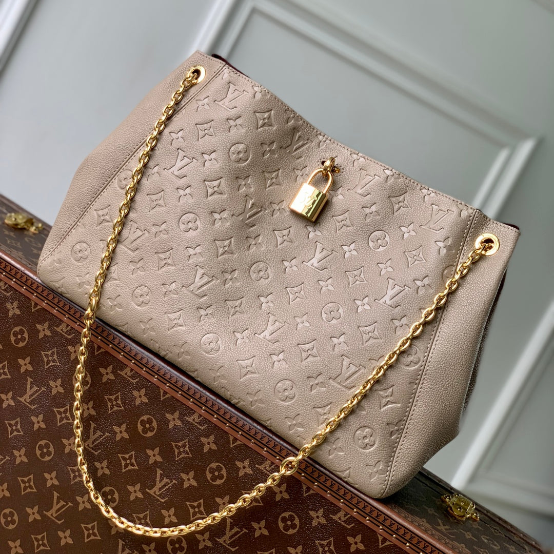 ANYTIME MM 42 IN TOURTERELLE GRAY MONOGRAM EMPREINTE CALFSKIN GOLD HARDWARE