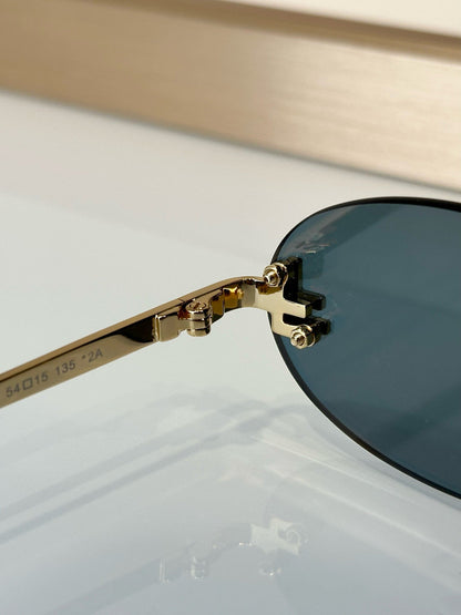 FIRST CRYSTAL RIMLESS OVAL FRAME SUNGLASSES FE4075US IN METAL