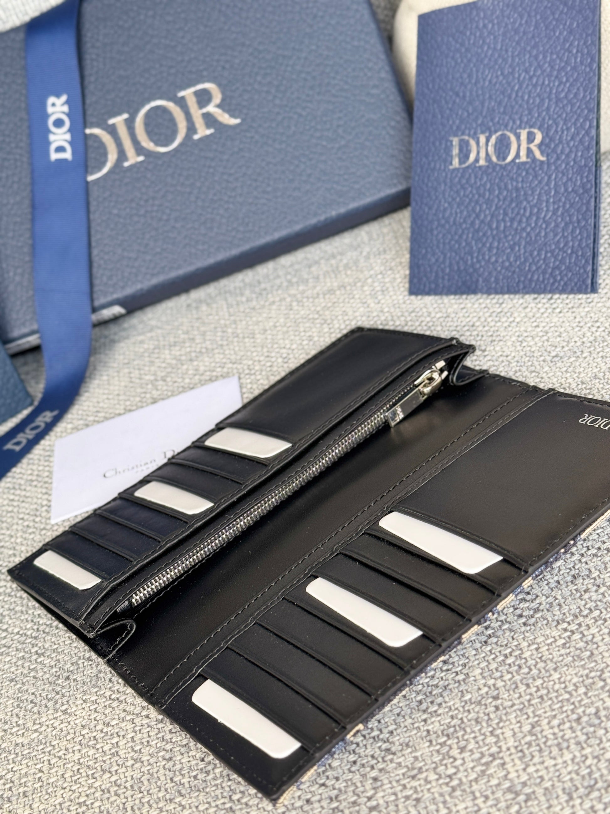 VERTICAL LONG WALLET 19 IN BLUE MONOGRAM OBLIQUE JACQUARD