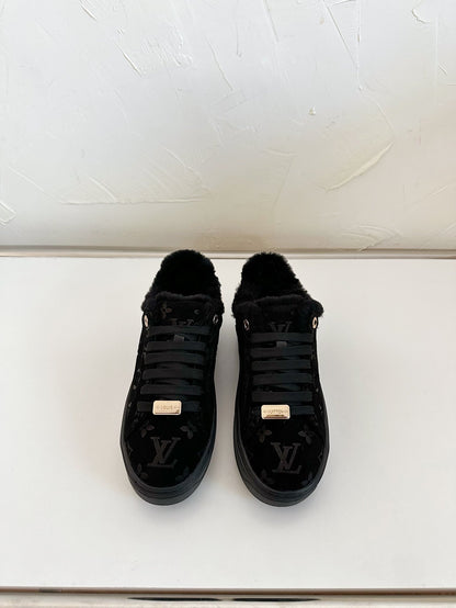 TIME OUT SNEAKER IN BLACK MONOGRAM EMBOSSED SUEDE WITH FLEECE LINING