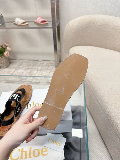 THONG SANDALS IN BLACK CALFSKIN AND CANVAS