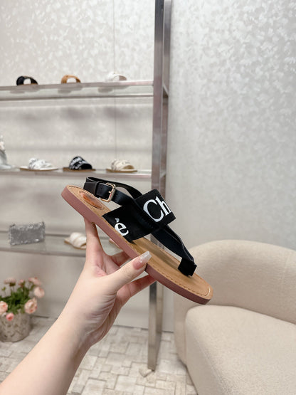 THONG SANDALS IN BLACK CALFSKIN AND CANVAS