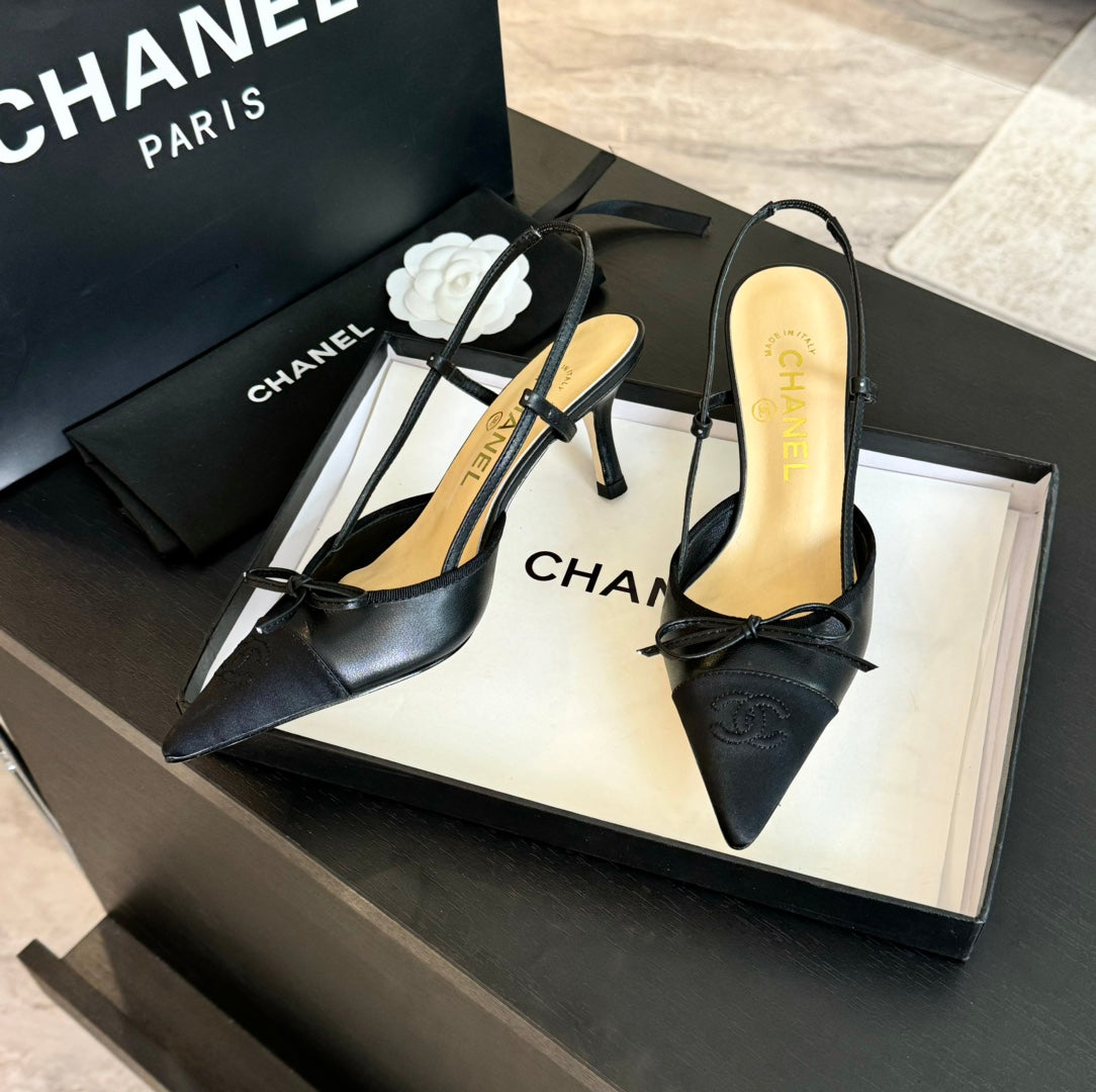 SLINGBACK WITH BOW IN BLACK LAMBSKIN