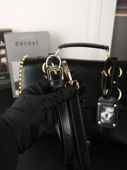 STUDDED BRIEFCASE 34 IN BLACK SHINY SMOOTH CALFSKIN