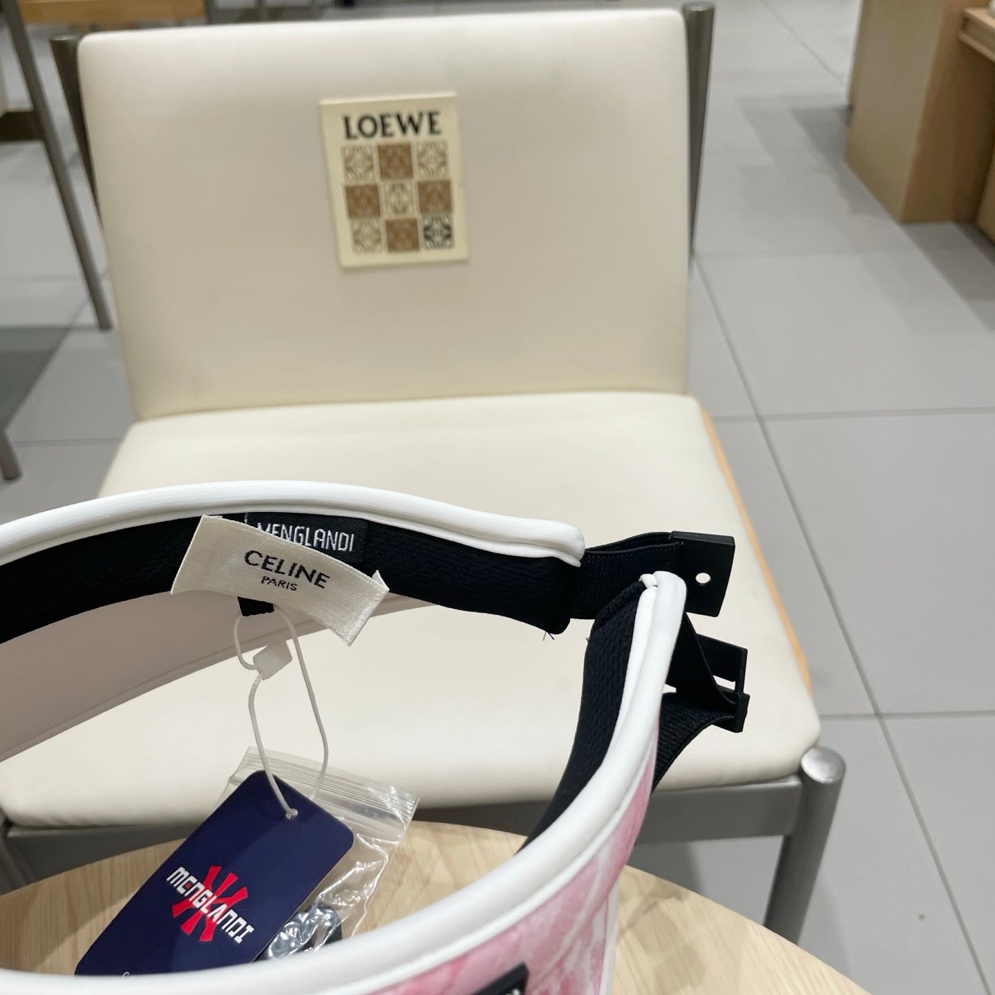 VISOR HAT MODEL 652203 IN PINK AND WHITE FABRIC