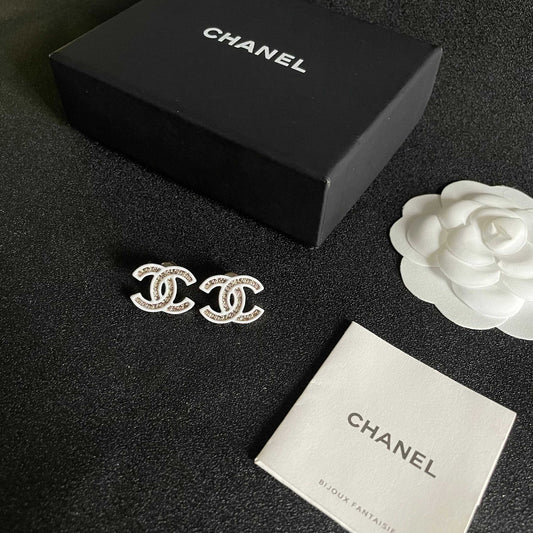 DOUBLE C STUD EARRINGS WITH WHITE TRIM AND CENTER STONE