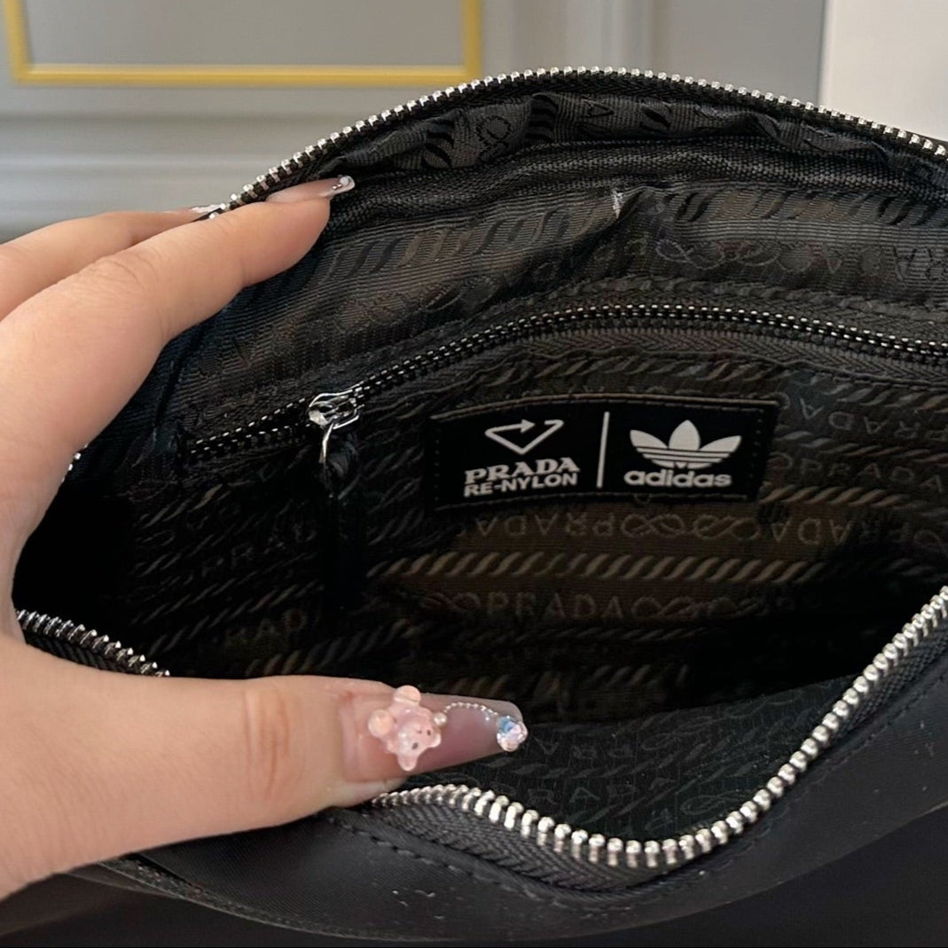 TRIANGLE LOGO CROSSBODY BAG 25 IN BLACK RE-NYLON