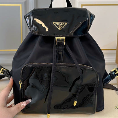 BACKPACK 30 IN BLACK RE-NYLON AND PATENT CALFSKIN GOLD HARDWARE