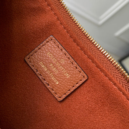 LIV POCHETTE BAG 24 IN COGNAC BROWN MONOGRAM EMPREINTE LEATHER