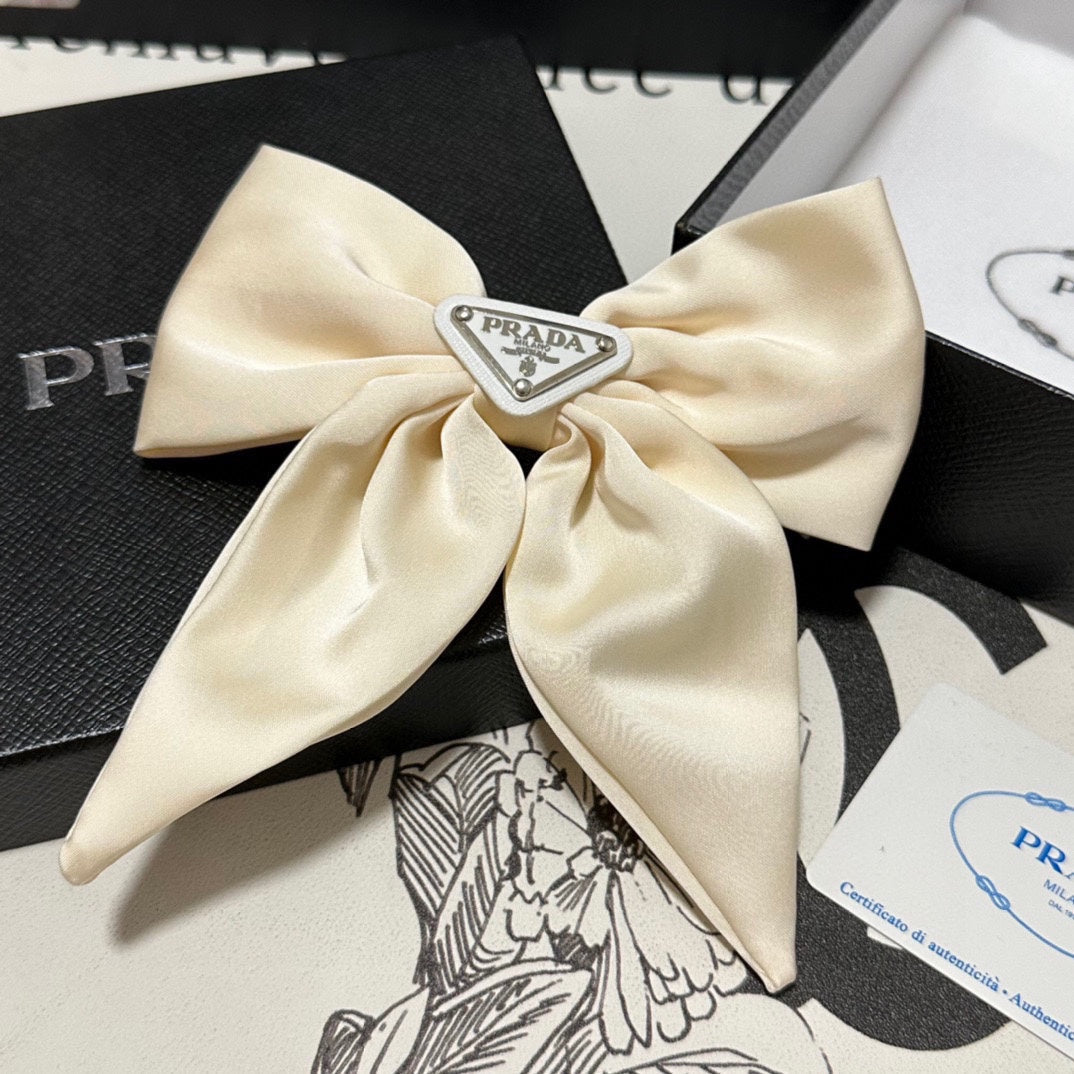 BOW-KNOT HAIR CLIP IN EGG SHELL SILK 358294