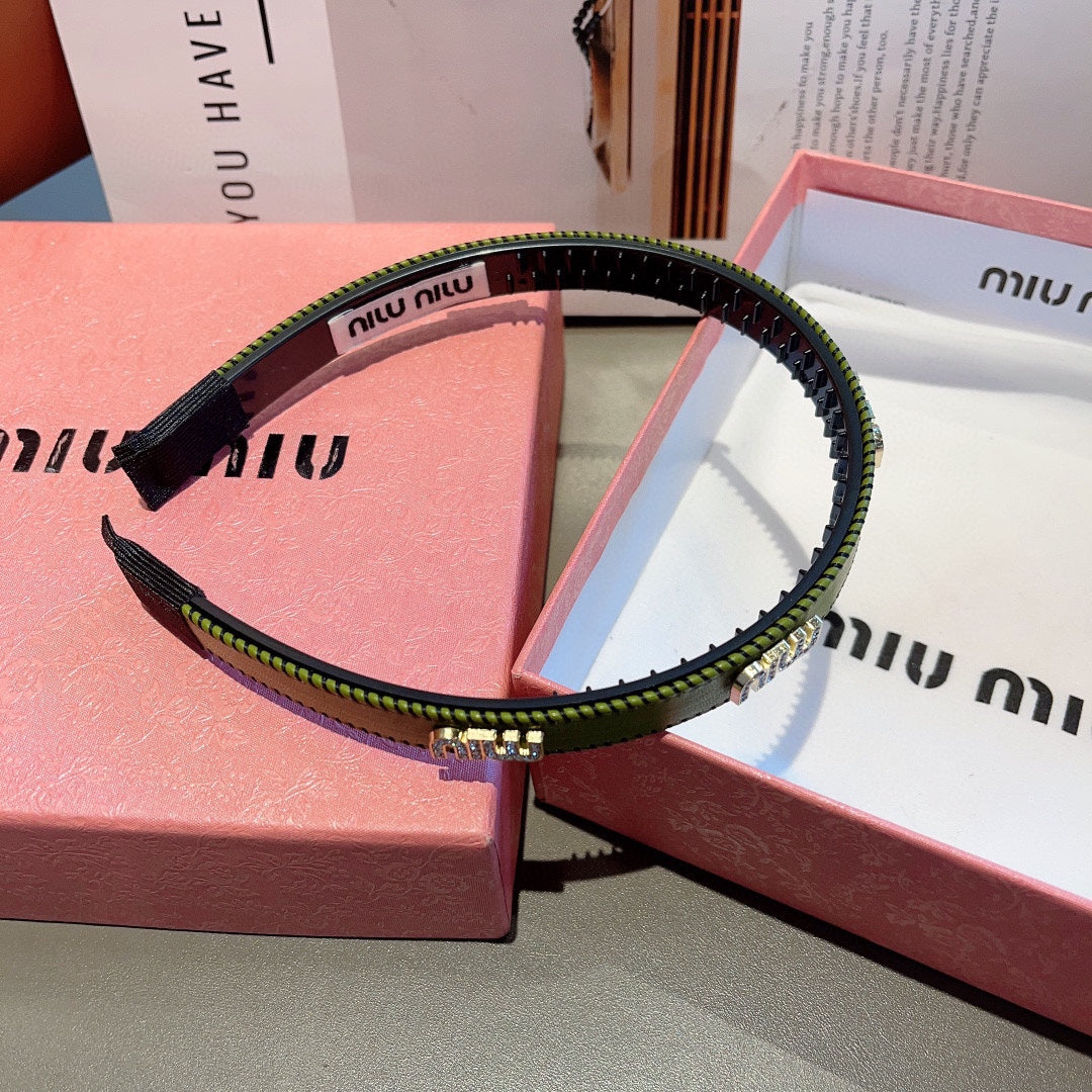 HEAD BAND IN OLIVE GREEN LAMBSKIN AND RESIN 417298