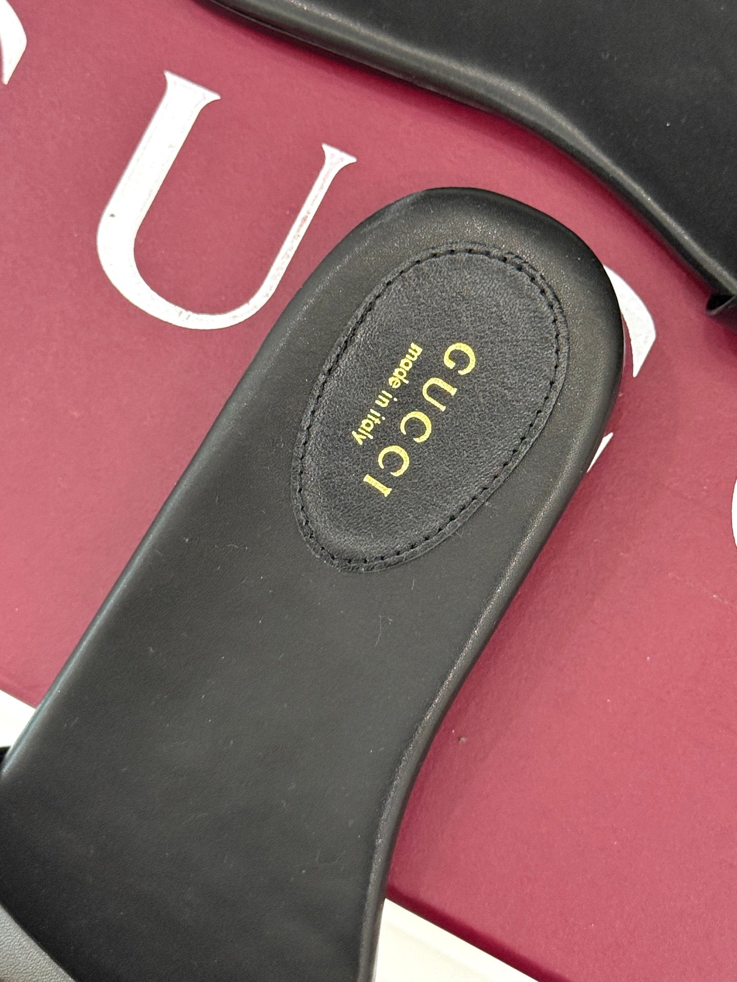 SLIDE SANDALS IN BLACK CALFSKIN WITH GOLD HARDWARE