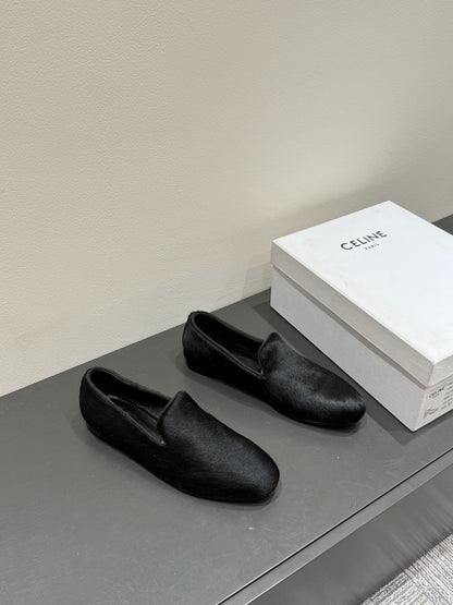 FURRY LOAFERS IN BLACK CALF HAIR