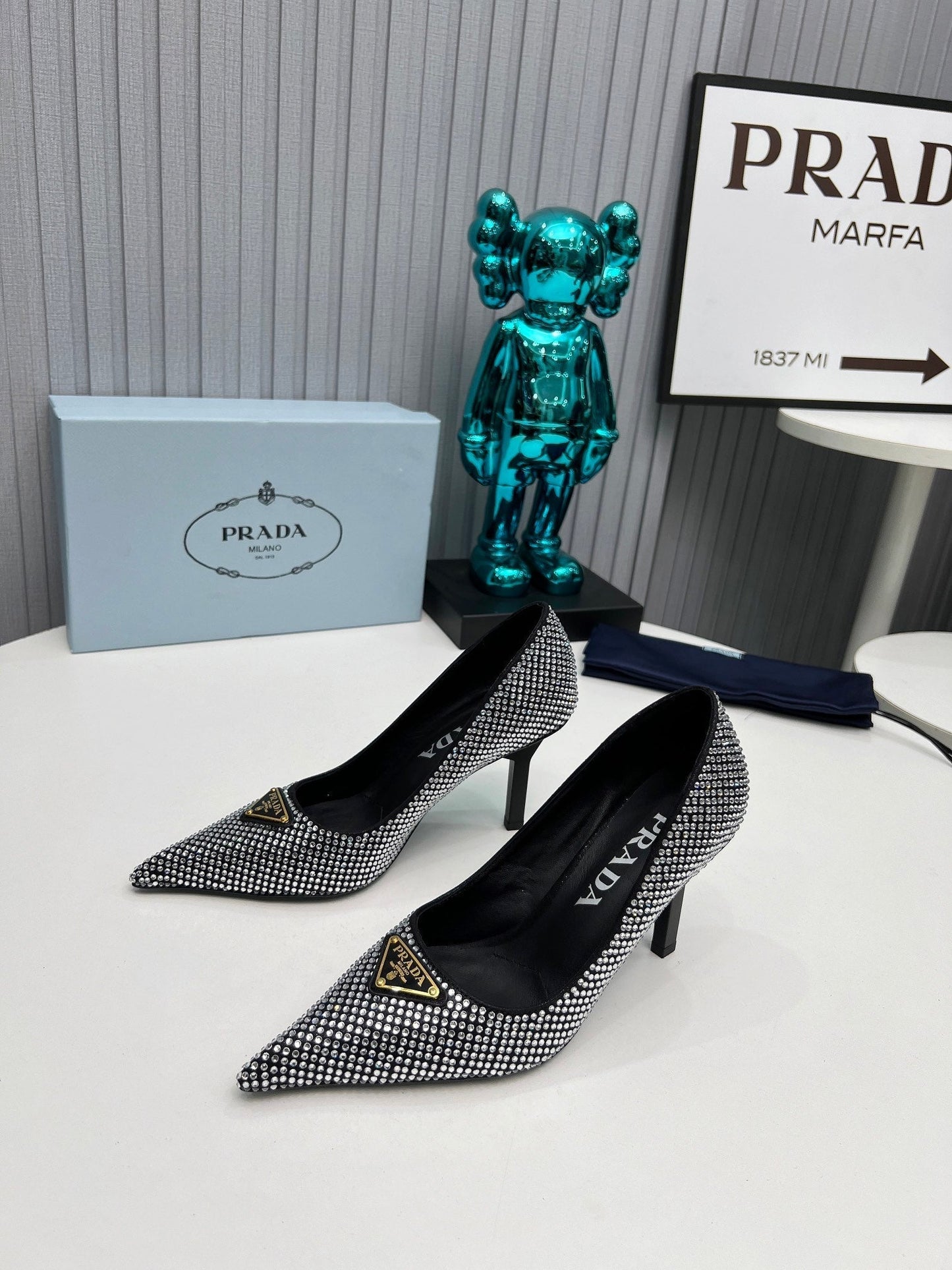 TRIANGLE LOGO HIGH-HEEL PUMPS IN BLACK SATIN WITH WHITE CRYSTALS