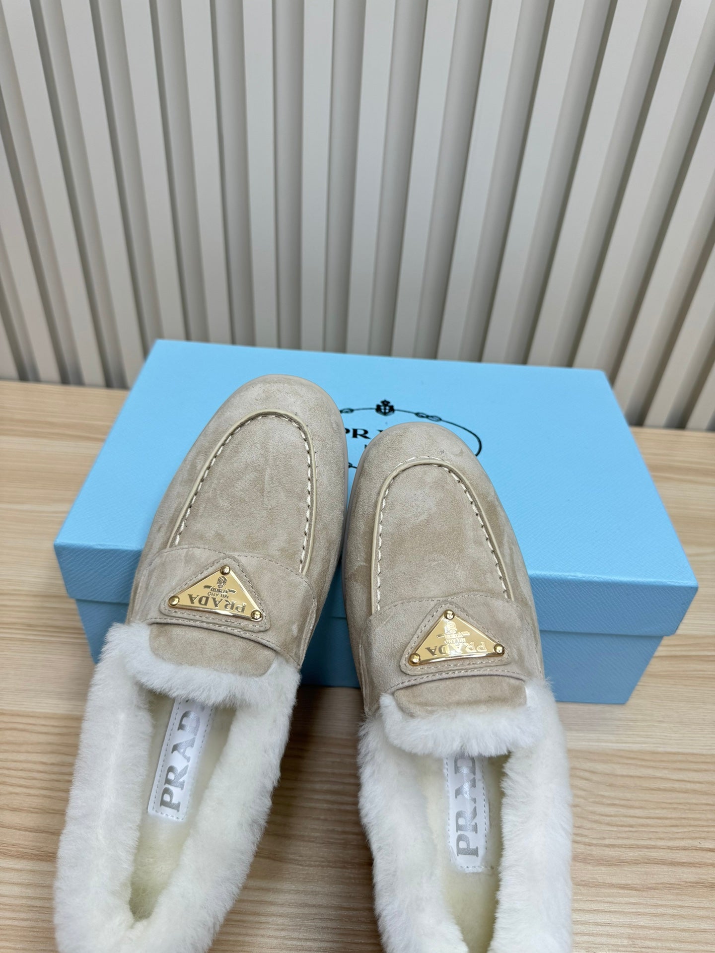 LOAFER IN KHAKI BEIGE SUEDE AND FUR LINING ATTACHED TRIANGLE LOGO