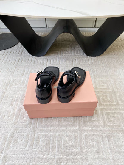 THONG SANDALS IN BLACK LAMBSKIN WITH SILVER BUCKLE