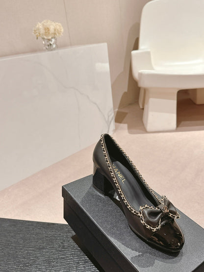 BOWKNOT HIGH HEELS IN BLACK SHEEPSKIN