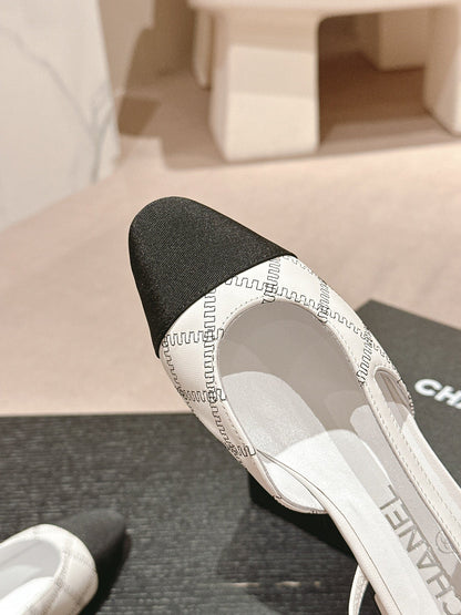 SLINGBACKS IN WHITE LAMBSKIN AND BLACK SATIN