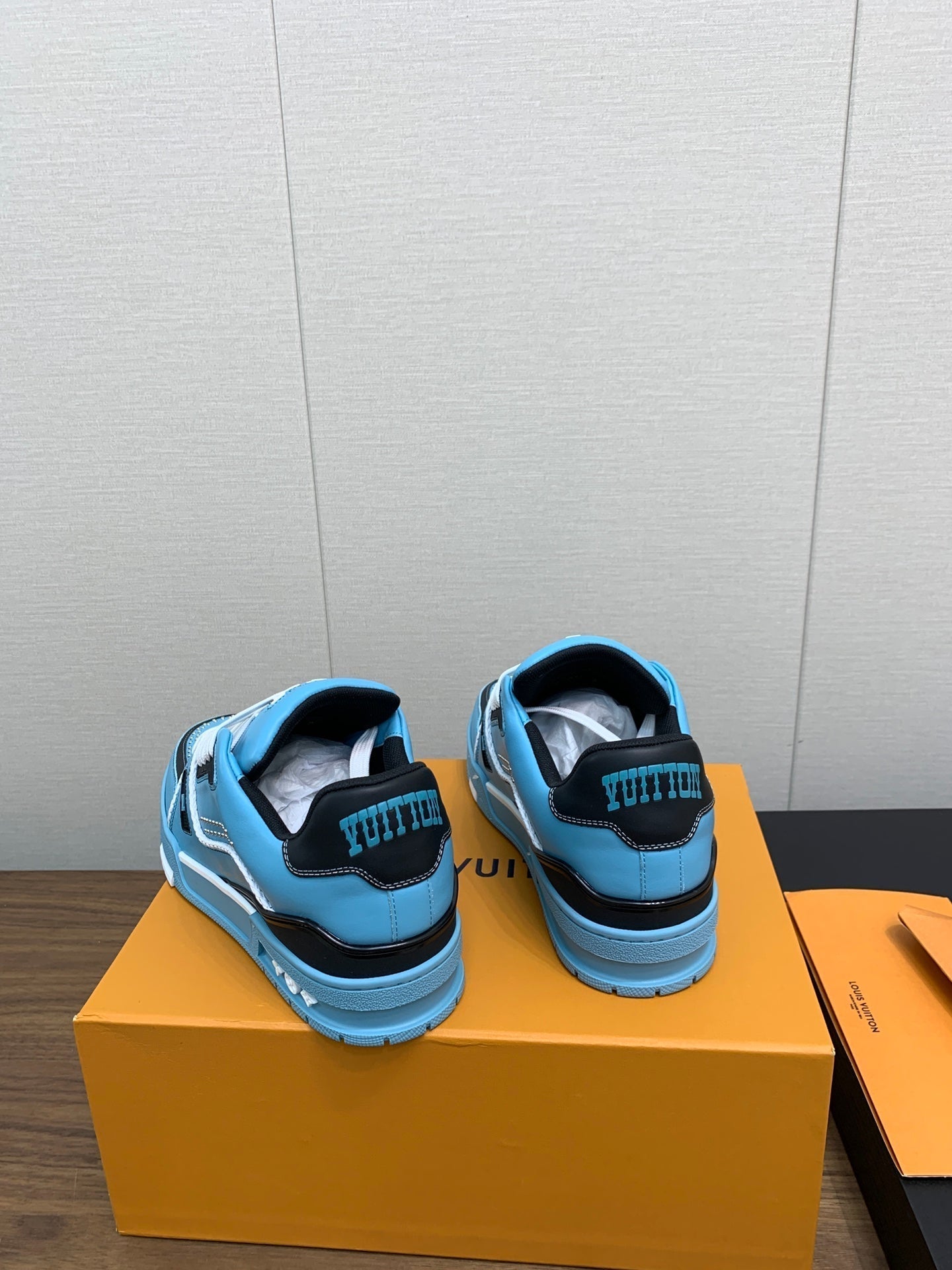 LV WOMEN'S TRAINER IN CERULEAN BLUE CALFSKIN