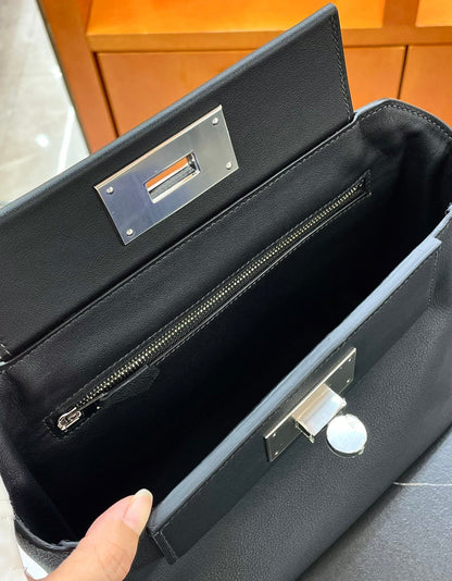 MINI 24/24 21CM IN BLACK EVERCOLOR CALFSKIN SILVER KELLY BUCKLE