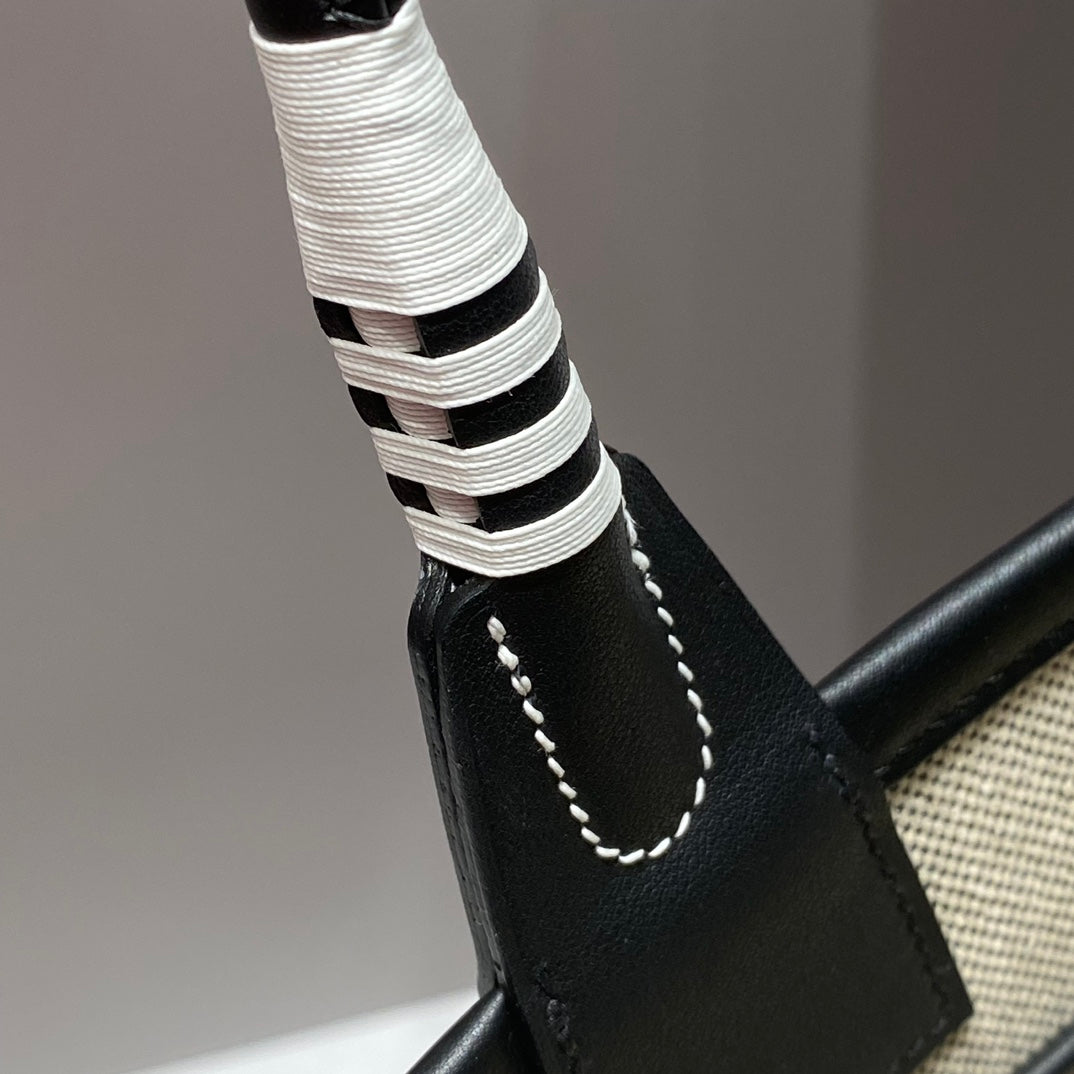 STEEPLE 28 BAG IN OFF-WHITE H CANVAS AND BLACK SWIFT CALFSKIN