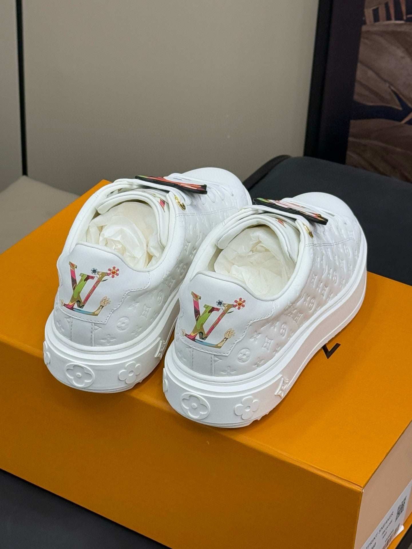 TIME OUT SNEAKER IN WHITE EMBOSSED MONOGRAM CALFSKIN