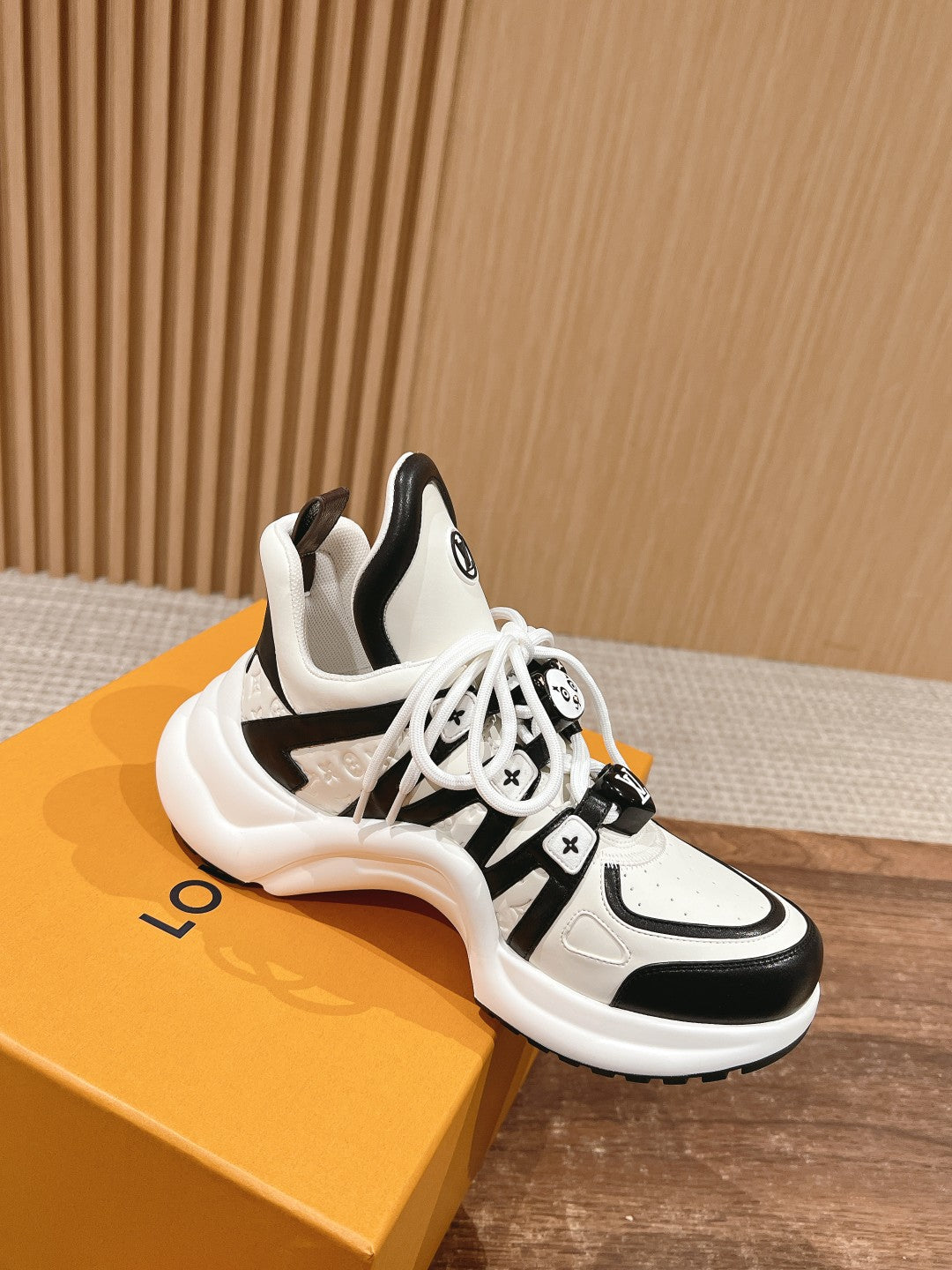 LV ARCHLIGHT SNEAKER IN WHITE MIX BLACK EMBOSSED CALFSKIN 101058