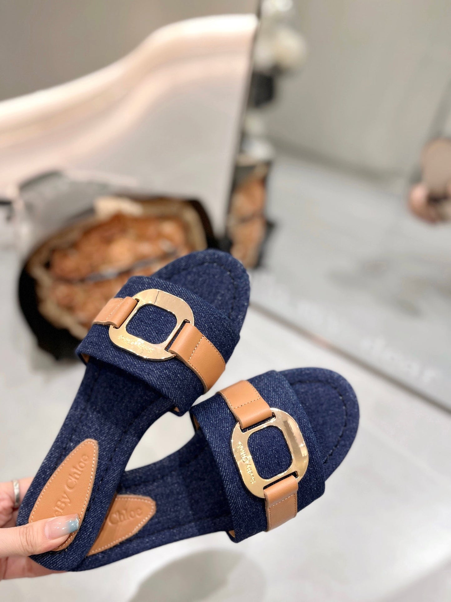 SLIDE MULE IN NAVY BLUE DENIM AND BROWN CALFSKIN GOLD HARDWARE