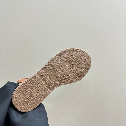 TRIUMPH FLAT SANDALS IN DESERT SAND CALFSKIN
