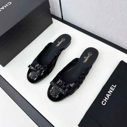 BOW MULE IN BLACK FABRIC AND CALFSKIN